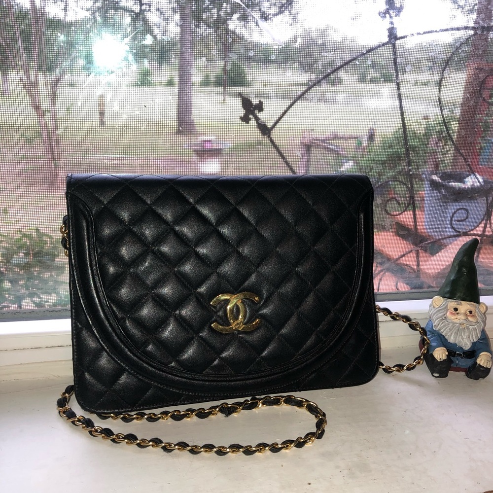 black and gold, leather, crossbody chanel bag